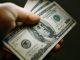 Dólar opera em alta e chega a R$ 5,20